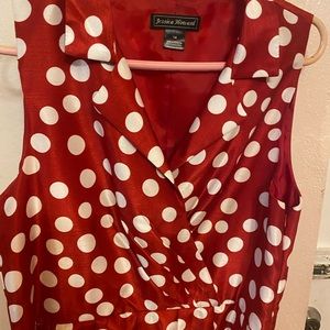 Red and white polka dot dress with pleats.